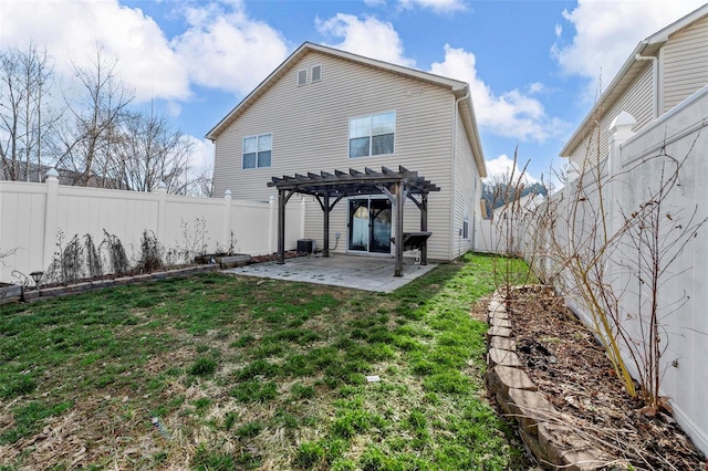 rear view of property with a pergola, central AC, a fenced backyard, a yard, and a patio area