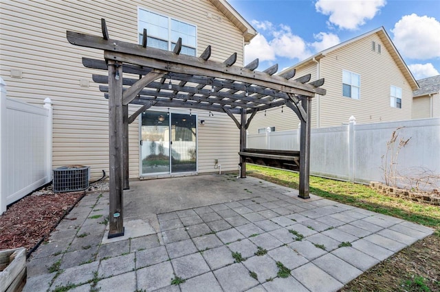 view of patio / terrace with cooling unit, a pergola, and fence