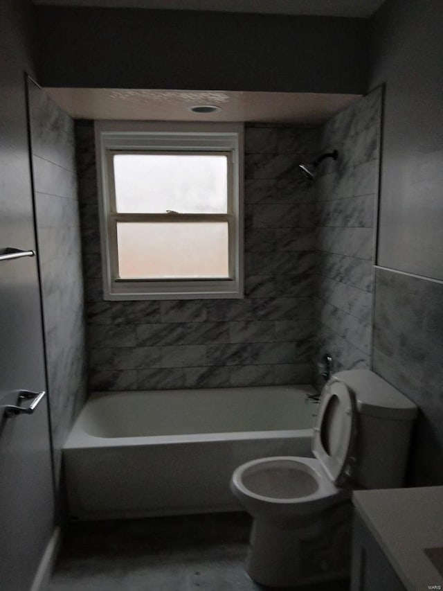 full bathroom featuring shower / bathtub combination, vanity, and toilet