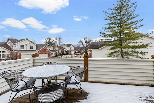 wooden deck with a residential view