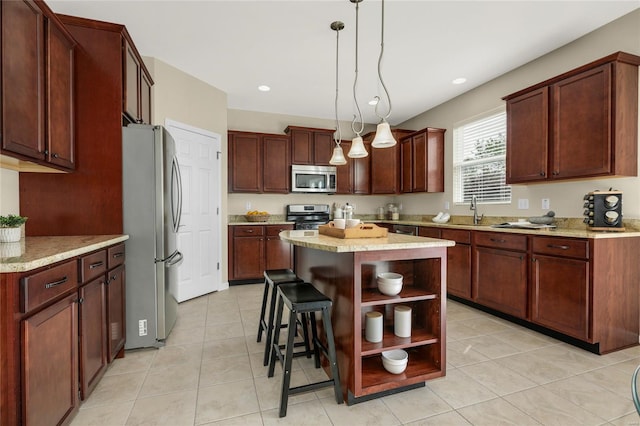 kitchen with appliances with stainless steel finishes, hanging light fixtures, open shelves, a center island, and light tile patterned floors