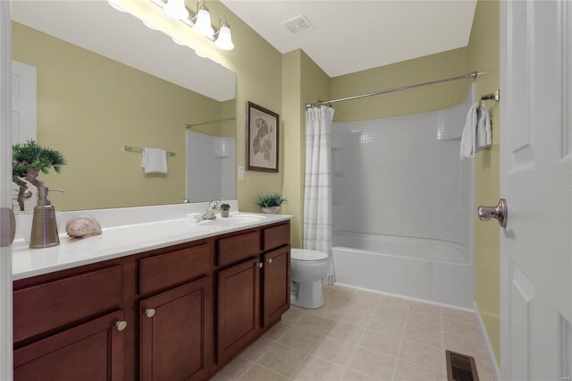 bathroom featuring vanity, shower / tub combo with curtain, toilet, and visible vents