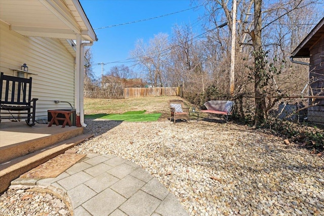 view of yard featuring a patio area and fence