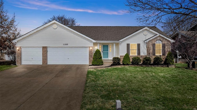 ranch-style house featuring driveway, a front yard, a shingled roof, a garage, and brick siding