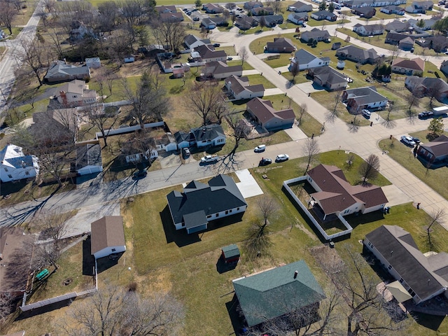 birds eye view of property with a residential view