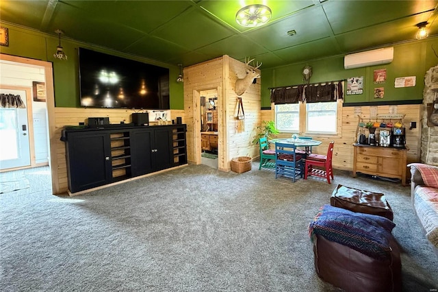 carpeted living area with wood walls, a wainscoted wall, and a wall mounted AC