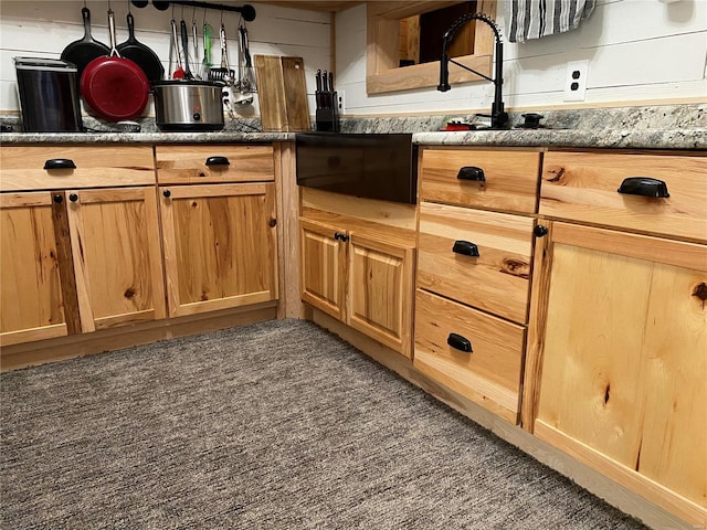 kitchen with dark stone counters