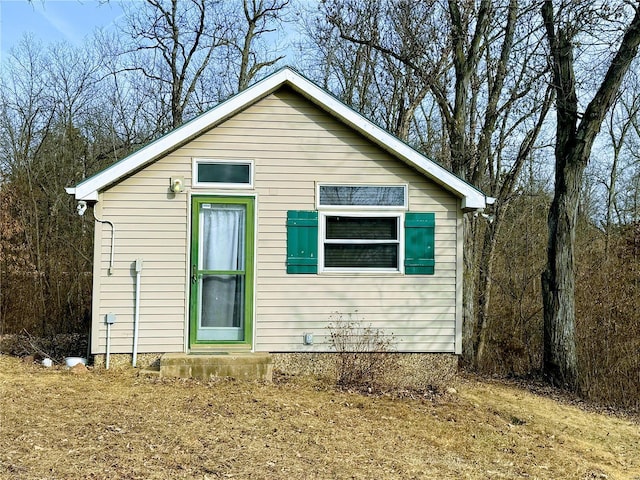 view of outbuilding featuring entry steps