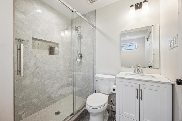 full bath featuring visible vents, a stall shower, toilet, and vanity