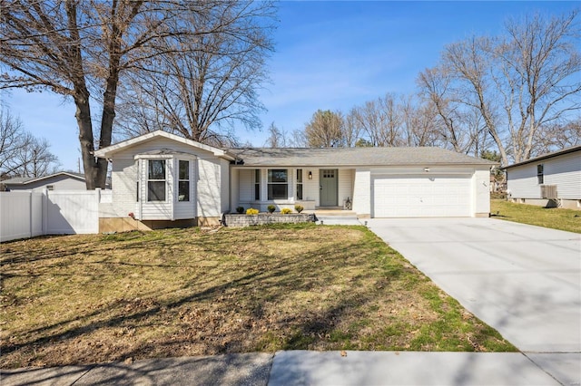 ranch-style home with driveway, a front lawn, fence, an attached garage, and brick siding