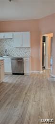 unfurnished living room featuring wood finished floors