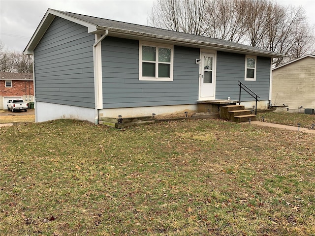 view of front of property with a front lawn