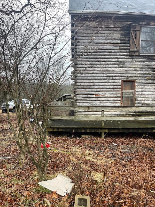 view of home's exterior with log exterior