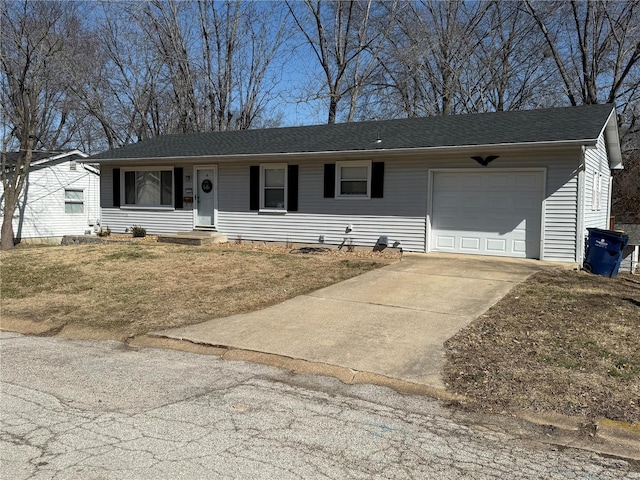 single story home featuring concrete driveway, a garage, and a shingled roof