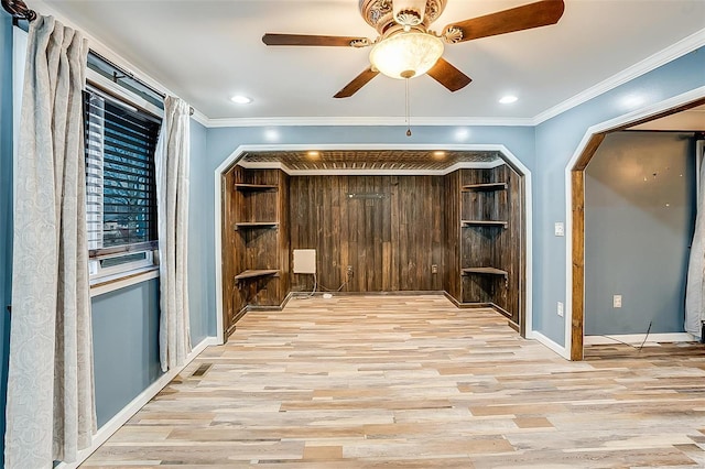 interior space featuring recessed lighting, baseboards, light wood-style floors, and ornamental molding