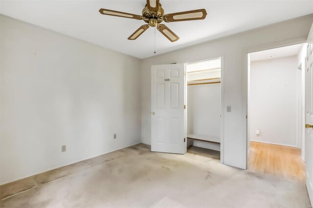 unfurnished bedroom featuring a ceiling fan
