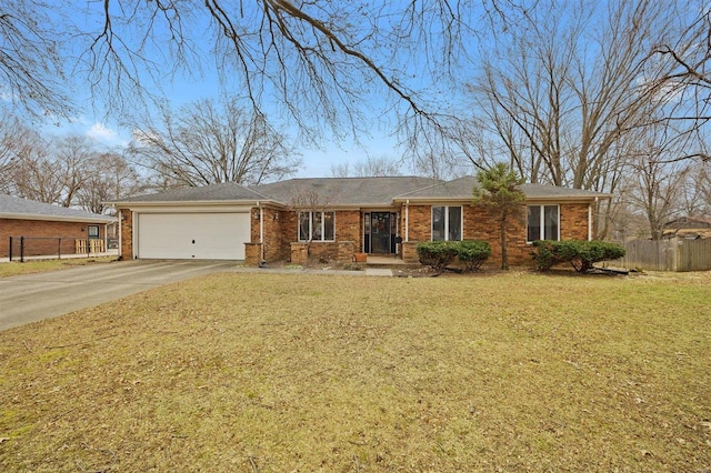 ranch-style home featuring a garage, driveway, a front yard, and fence