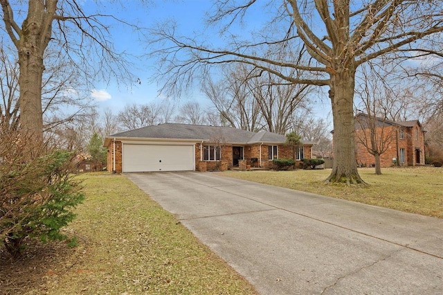 single story home with a garage, concrete driveway, brick siding, and a front yard