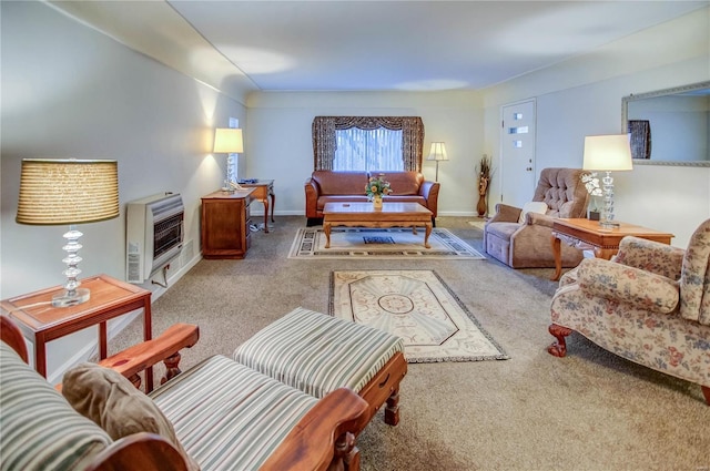 carpeted living area featuring heating unit and baseboards