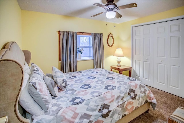 bedroom featuring a closet, ceiling fan, and carpet flooring