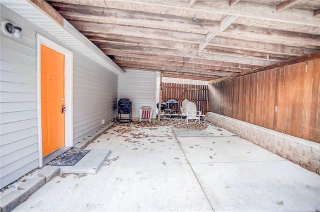 view of patio / terrace featuring fence