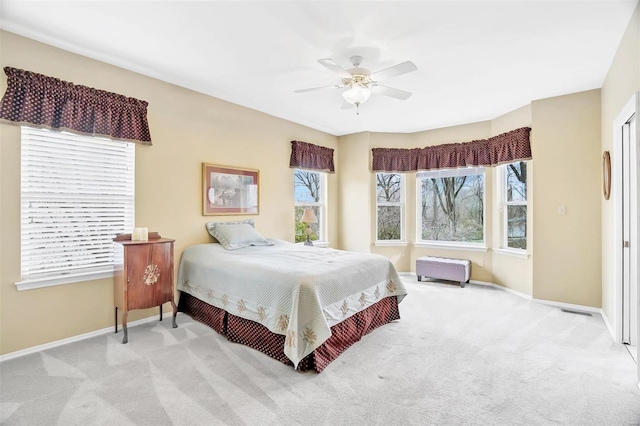 bedroom featuring carpet, visible vents, and baseboards