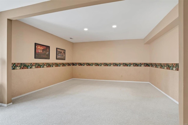 carpeted empty room with recessed lighting and baseboards