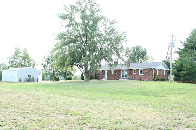 view of yard with central air condition unit