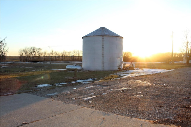 view of outdoor structure at dusk