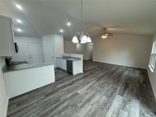 kitchen featuring a ceiling fan, lofted ceiling, dishwashing machine, stove, and dark wood-type flooring