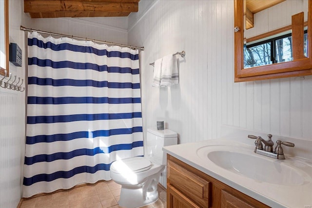 full bathroom featuring a shower with curtain, lofted ceiling, toilet, vanity, and tile patterned flooring