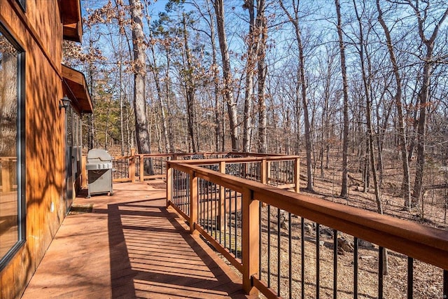 wooden deck featuring grilling area