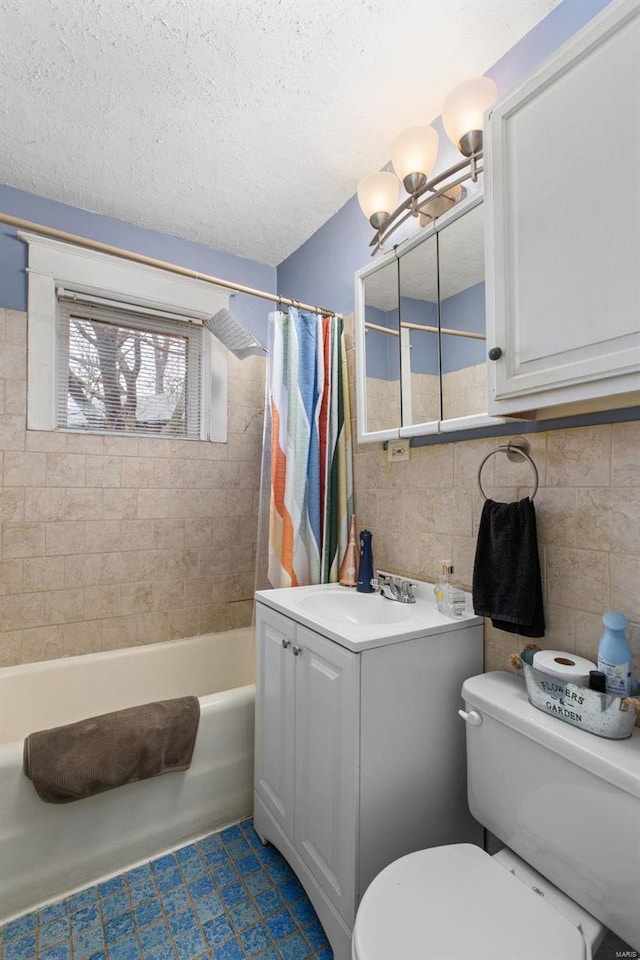 bathroom featuring toilet, a textured ceiling, tile walls, and shower / bath combo