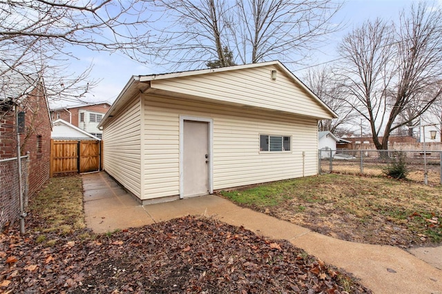 view of outdoor structure with an outbuilding and a fenced backyard