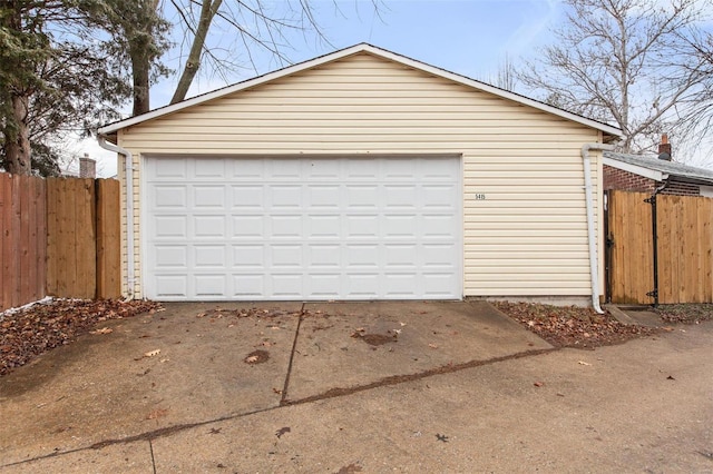 detached garage with fence