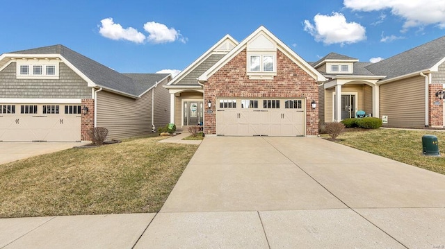 view of front of property featuring a front lawn, brick siding, and driveway