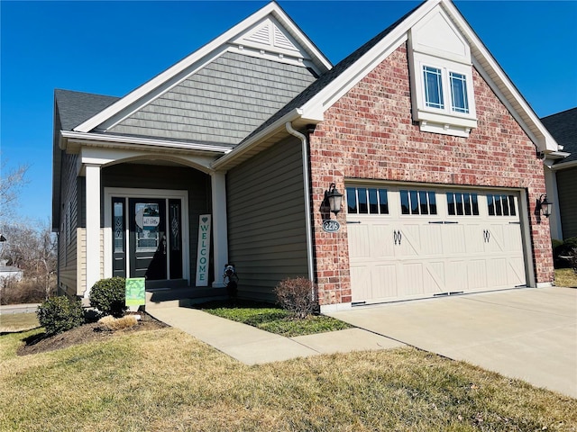 view of front of home with brick siding and driveway