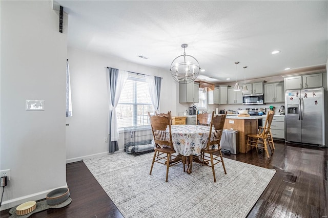 dining room featuring recessed lighting, dark wood finished floors, visible vents, and baseboards