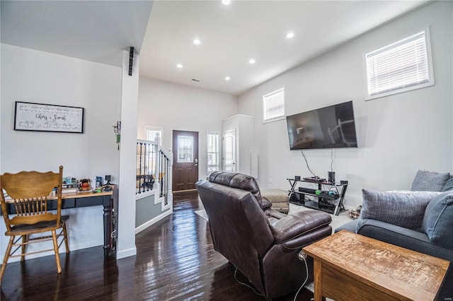 living area with stairs, baseboards, wood finished floors, and recessed lighting