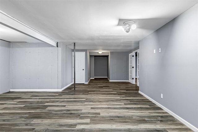 finished basement with wood finished floors and baseboards