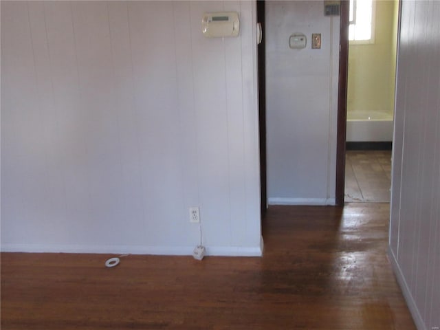 hall featuring wood finished floors