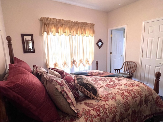 bedroom with multiple windows