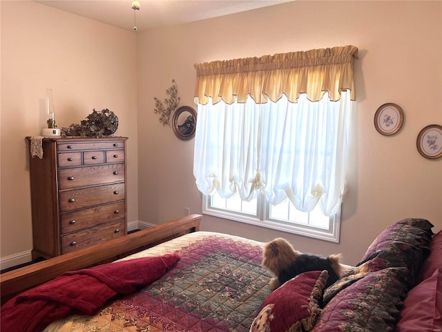 bedroom with baseboards