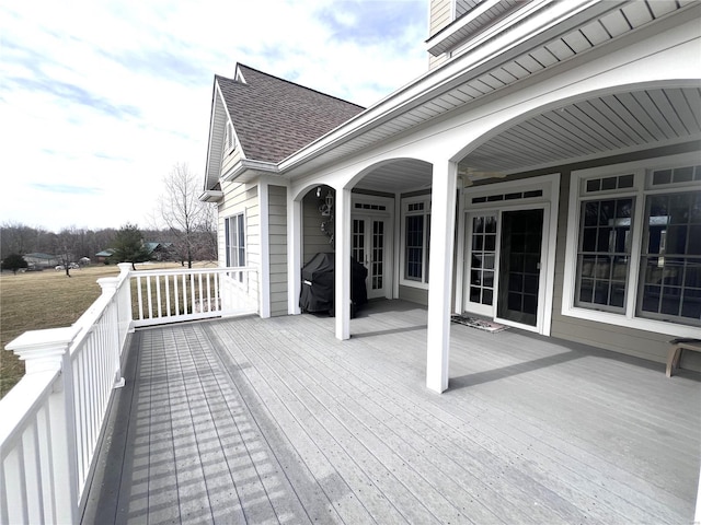 wooden deck with area for grilling