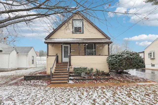 bungalow with stairs and a porch