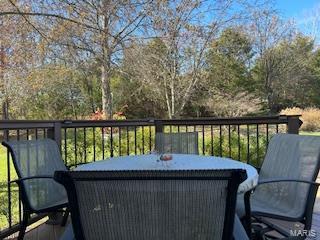 view of wooden balcony featuring a wooden deck