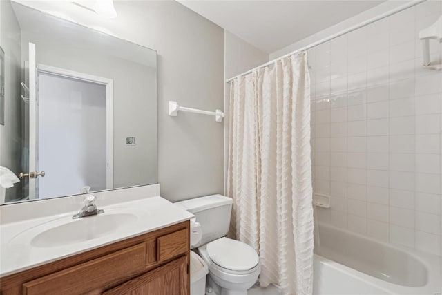 full bath with shower / bath combo with shower curtain, toilet, and vanity