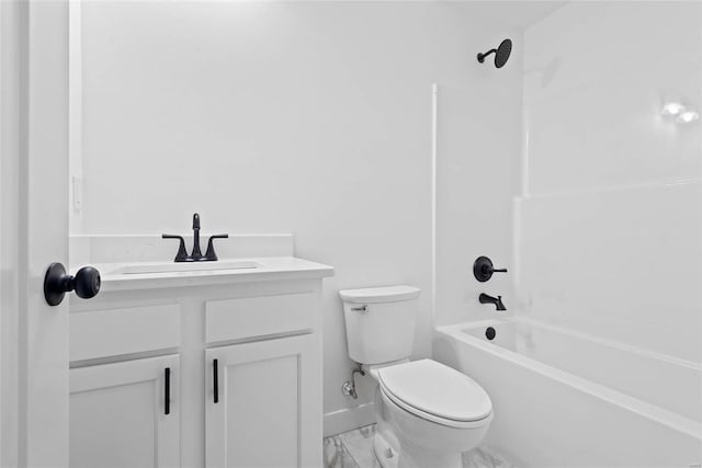 full bath featuring toilet, marble finish floor, shower / bathtub combination, and vanity