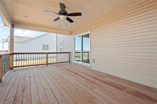 wooden deck with ceiling fan