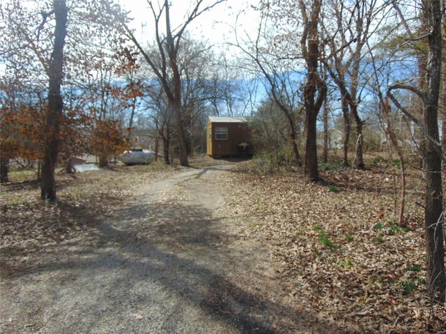 view of street featuring driveway